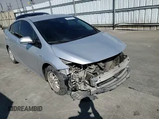 2017 Toyota Prius Plus z VIN JTDKARFP7H3051097, wystawiony jako Copart lot #60288305 z przebiegiem 196 867 mil mil oraz Szkoda całkowita • Salvage title. Historia ofert i sprzedaży dostępna na DreamBid. Obrazek 14.