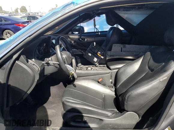 2018 Infiniti Q60 Luxe with VIN JN1EV7EL2JM390826, listed as a Copart auction lot 52806915 with 99,400 mi miles and Salvage title. Bid and sale history available at DreamBid. Image 7.