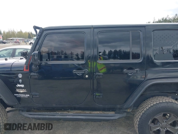 2014 Jeep Wrangler Unlimited Sahara with VIN 1C4BJWEG6EL107526, listed as a IAAI auction lot 42030244 with 69,077 mi miles. Bid and sale history available at carsss.com. Image 14.