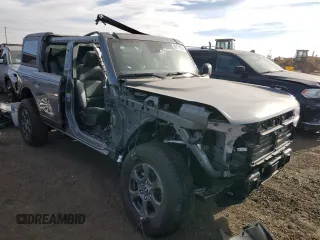 2024 Ford Bronco Big Bend z VIN 1FMDE7BH9RLA85832, wystawiony jako Copart lot #86171994 z przebiegiem 1 196 mil mil oraz Szkoda całkowita • Salvage title. Historia ofert i sprzedaży dostępna na DreamBid. Obrazek 4.