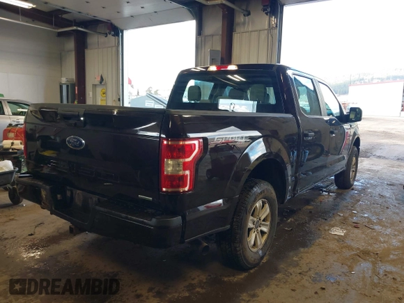 2018 Ford F-150 XL with VIN 1FTEW1EP2JFB69449, listed as a IAAI auction lot 41731427 with 111,922 mi miles. Bid and sale history available at carsss.com. Image 4.