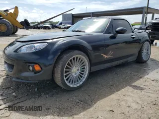 2015 Mazda MX-5 Miata Grand Touring z VIN JM1NC2PF8F0239596, wystawiony jako Copart lot #69830274 z przebiegiem 92 237 mil mil oraz Szkody całkowita. Historia ofert i sprzedaży dostępna na DreamBid. Obrazek 1.