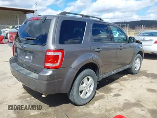 2012 Ford Escape XLT with VIN 1FMCU0D76CKC01916, listed as a IAAI auction lot 41879331 with 194,201 mi miles. Bid and sale history available at carsss.com. Image 4.