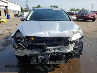 2015 Ford Focus SE with VIN 1FADP3F2XFL321208, listed as a Copart auction lot 61413005 with 139,439 mi miles and Salvage title. Bid and sale history available at DreamBid. Image 5.