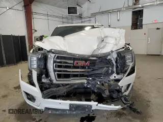 2022 GMC Yukon SLT with VIN 1GKS2BKD6NR106829, listed as a Copart auction lot 51065995 with 69,409 mi miles and Salvage Title. Bid and sale history available at carsss.com. Image 5.