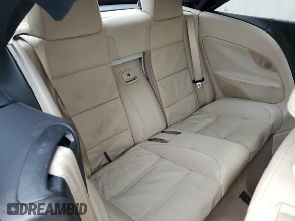 2007 Volkswagen Eos 2.0T with VIN WVWFA71F57V052000, listed as a Copart auction lot 87598495 with 128,610 mi miles and Salvage Title. Bid and sale history available at DreamBid. Image 10.