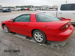 2002 Chevrolet Camaro z VIN 2G1FP22K322135404, wystawiony jako Copart lot #58767305 z przebiegiem Nie podano mil oraz Czysty tytuł • Clean title. Historia ofert i sprzedaży dostępna na DreamBid. Obrazek 2.