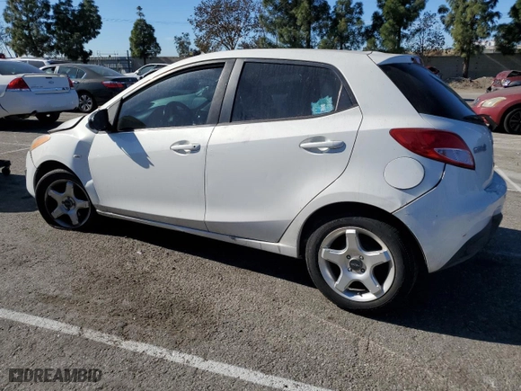 2013 Mazda Mazda2 Sport with VIN JM1DE1KZ2D0163761, listed as a Copart auction lot 87268604 with 126,697 mi miles and Salvage Title. Bid and sale history available at carsss.com. Image 2.