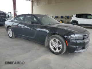 2023 Dodge Charger SXT with VIN 2C3CDXBG6PH533386, listed as a Copart auction lot 54747195 with 50,475 mi miles and Clean Title. Bid and sale history available at carsss.com. Image 4.