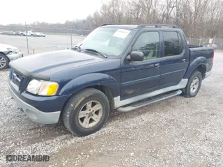 2003 Ford Explorer Sport Trac XLS with VIN 1FMZU77E33UB91041, listed as a IAAI auction lot 40965975 with 276,101 mi miles. Bid and sale history available at carsss.com. Image 2.