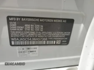 2018 BMW 5 Series 530i z VIN WBAJA5C54JWA57368, wystawiony jako Copart lot #49700045 z przebiegiem Nie podano mil oraz Szkody całkowita. Historia ofert i sprzedaży dostępna na DreamBid. Obrazek 13.