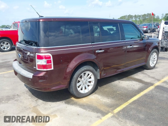 2009 Ford Flex SEL with VIN 2FMEK62C99BA17882, listed as a IAAI auction lot 42072947 with 170,054 mi miles. Bid and sale history available at carsss.com. Image 4.
