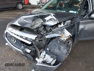 2015 Infiniti Q50 Premium z VIN JN1BV7AR3FM422042, wystawiony jako IAAI lot #42258784 z przebiegiem 72 030 mil mil oraz . Historia ofert i sprzedaży dostępna na DreamBid. Obrazek 6.