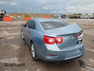 2013 Chevrolet Malibu LTZ with VIN 1G11H5SA0DU109940, listed as a IAAI auction lot 42106086 with 205,634 mi miles and . Bid and sale history available at DreamBid. Image 3.