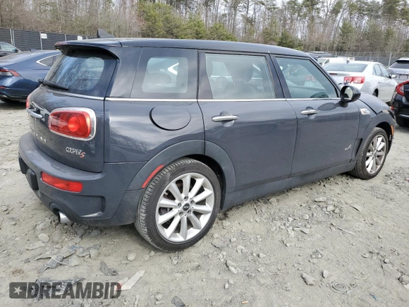 2017 MINI Clubman Cooper S with VIN WMWLU5C57H2E82584, listed as a Copart auction lot 48861365 with 90,418 mi miles and Salvage Title. Bid and sale history available at DreamBid. Image 3.