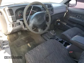2000 Nissan Frontier XE with VIN 1N6ED27T7YC300373, listed as a Copart auction lot 55829535 with 301,305 mi miles and Salvage title. Bid and sale history available at DreamBid. Image 8.