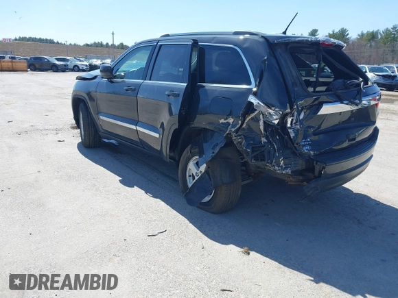 2011 Jeep Grand Cherokee Laredo z VIN 1J4RR4GG9BC519132, wystawiony jako IAAI lot #41931266 z przebiegiem 118 534 mil mil oraz . Historia ofert i sprzedaży dostępna na DreamBid. Obrazek 3.
