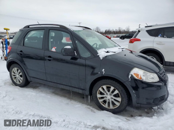 2013 Suzuki SX4 with VIN JS2YB5A44D6100218, listed as a Copart auction lot 43558615 with 165,025 mi miles and Salvage Title. Bid and sale history available at DreamBid. Image 4.
