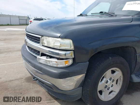 2005 Chevrolet Tahoe LS z VIN 1GNEK13T05J124225, wystawiony jako IAAI lot #41699401 z przebiegiem 253 632 mil mil oraz . Historia ofert i sprzedaży dostępna na DreamBid. Obrazek 6.