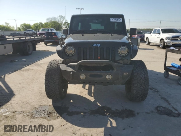 2013 Jeep Wrangler Unlimited Freedom z VIN 1C4BJWDG0DL513902, wystawiony jako Copart lot #52045975 z przebiegiem 166 827 mil mil oraz Szkoda całkowita • Salvage title. Historia ofert i sprzedaży dostępna na DreamBid. Obrazek 5.