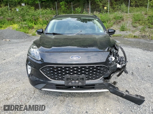 2020 Ford Escape Titanium с VIN 1FMCU9J97LUA20595, выставлен на аукционе Copart как лот 59476745 с пробегом 74 518 миль миль и Списание • Salvage title. История ставок и продаж доступна на DreamBid. Изображение 5.