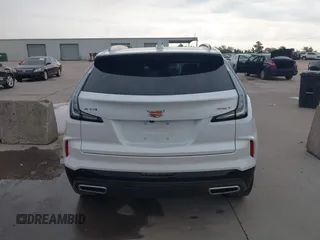 2024 Cadillac XT4 FWD Sport with VIN 1GYFZER42RF246488, listed as a IAAI auction lot 42029551 with 6,476 mi miles and . Bid and sale history available at DreamBid. Image 17.