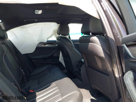 2019 BMW 5 Series 530i xDrive with VIN WBAJA7C50KG910479, listed as a IAAI auction lot 41802413 with 84,932 mi miles. Bid and sale history available at carsss.com. Image 8.