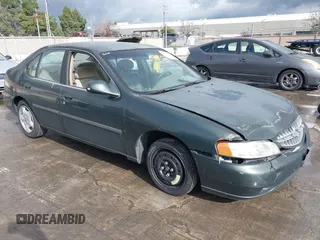 2000 Nissan Altima XE with VIN 1N4DL01D4YC102704, listed as a IAAI auction lot 41538425 with 228,639 mi miles. Bid and sale history available at carsss.com. Image 1.