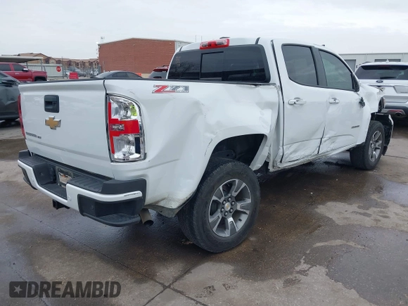 2019 Chevrolet Colorado 4WD Z71 z VIN 1GCGTDEN3K1317883, wystawiony jako IAAI lot #41439010 z przebiegiem 34 306 mil mil oraz . Historia ofert i sprzedaży dostępna na DreamBid. Obrazek 4.