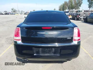 2014 Chrysler 300 with VIN 2C3CCAAG9EH264914, listed as a IAAI auction lot 42003052 with 103,789 mi miles. Bid and sale history available at carsss.com. Image 16.