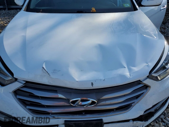 2017 Hyundai Santa Fe 2.0T z VIN 5XYZUDLA3HG397569, wystawiony jako Copart lot #77360944 z przebiegiem 145 512 mil mil oraz Szkoda całkowita • Salvage title. Historia ofert i sprzedaży dostępna na DreamBid. Obrazek 13.