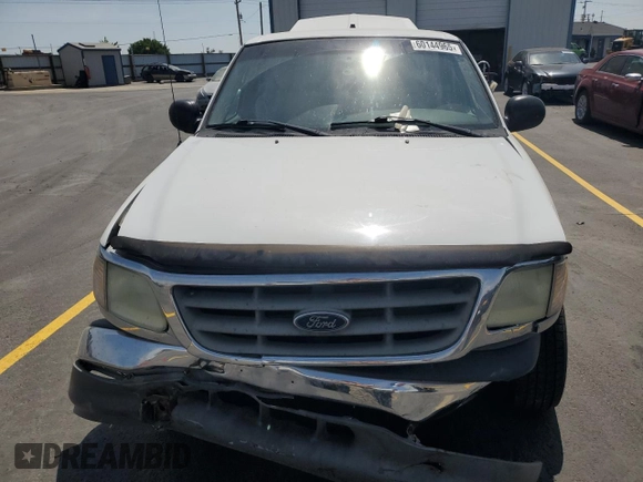 2003 Ford F-150 XL with VIN 2FTRX17L23CA17128, listed as a Copart auction lot 60144965 with 121,055 mi miles and Salvage title. Bid and sale history available at DreamBid. Image 5.