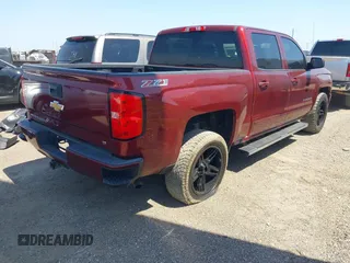 2017 Chevrolet Silverado 1500 LT with VIN 3GCUKREC8HG259071, listed as a IAAI auction lot 42078117 with 158,606 mi miles and . Bid and sale history available at DreamBid. Image 4.