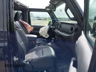 2023 Jeep Gladiator Overland with VIN 1C6HJTFG6PL555153, listed as a IAAI auction lot 42210878 with 40,576 mi miles and . Bid and sale history available at DreamBid. Image 5.