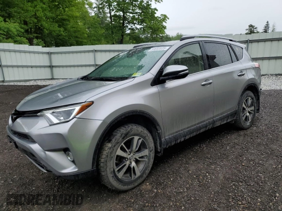 2018 Toyota RAV4 XLE with VIN JTMRFREV2JJ200677, listed as a Copart auction lot 59660535 with 82,283 mi miles and Salvage title. Bid and sale history available at DreamBid. Image 1.
