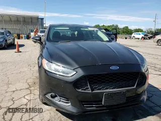 2015 Ford Fusion SE z VIN 1FA6P0HDXF5103053, wystawiony jako Copart lot #57763875 z przebiegiem 121 789 mil mil oraz Szkoda całkowita • Salvage title. Historia ofert i sprzedaży dostępna na DreamBid. Obrazek 13.