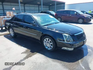 2011 Cadillac DTS Premium Collection z VIN 1G6KH5E65BU140314, wystawiony jako IAAI lot #42050040 z przebiegiem 149 921 mil mil oraz . Historia ofert i sprzedaży dostępna na DreamBid. Obrazek 1.