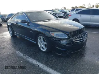 2009 Mercedes-Benz CL-Class V8 AMG with VIN WDDEJ77X89A020041, listed as a IAAI auction lot 41590508 with 127,040 mi miles. Bid and sale history available at carsss.com. Image 1.