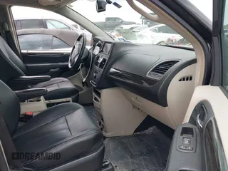2016 Chrysler Town & Country Touring with VIN 2C4RC1BG7GR287707, listed as a IAAI auction lot 42136625 with 86,684 mi miles and . Bid and sale history available at DreamBid. Image 5.