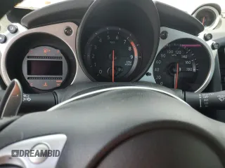 2014 Nissan 370Z with VIN JN1AZ4EH6EM633797, listed as a Copart auction lot 74027354 with Not Provided miles and Salvage Title. Bid and sale history available at DreamBid. Image 9.