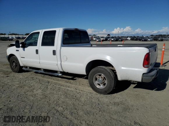 2003 Ford F-350 XL with VIN 1FTSW30F63EB07672, listed as a Copart auction lot 76659184 with 243,580 mi miles and Salvage Title. Bid and sale history available at DreamBid. Image 2.