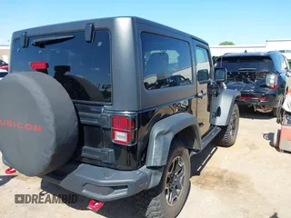 2015 Jeep Wrangler Rubicon Hard Rock with VIN 1C4BJWCG1FL610028, listed as a IAAI auction lot 42318569 with 48,627 mi miles and . Bid and sale history available at DreamBid. Image 6.