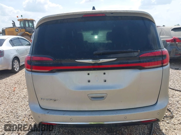 2023 Chrysler Pacifica Touring L with VIN 2C4RC1BG7PR521232, listed as a IAAI auction lot 42087909 with 34,609 mi miles and . Bid and sale history available at DreamBid. Image 15.