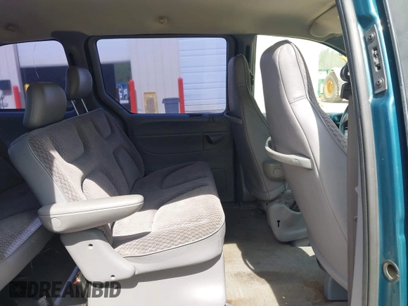 2000 Dodge Caravan with VIN 2B4FP25B8YR708751, listed as a IAAI auction lot 42471041 with 200,820 mi miles and . Bid and sale history available at DreamBid. Image 8.