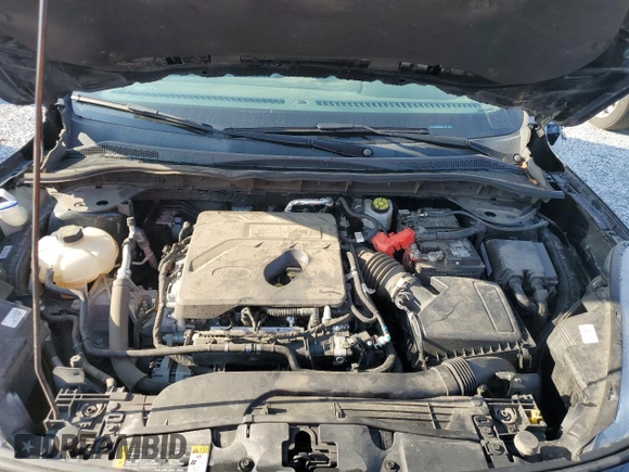 2020 Ford Escape SE z VIN 1FMCU9G60LUB71341, wystawiony jako Copart lot #64753865 z przebiegiem 138 490 mil mil oraz Czysty tytuł • Clean title. Historia ofert i sprzedaży dostępna na DreamBid. Obrazek 12.