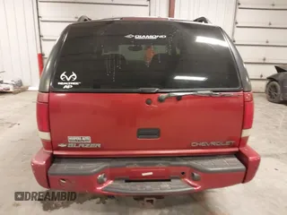 2000 Chevrolet Blazer LT z VIN 1GNDT13W1Y2358746, wystawiony jako IAAI lot #41541071 z przebiegiem 205 532 mil mil oraz . Historia ofert i sprzedaży dostępna na DreamBid. Obrazek 16.