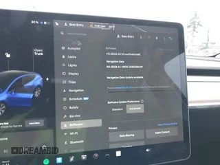 2021 Tesla Model Y Standard Range with VIN 5YJYGDED3MF103499, listed as a IAAI auction lot 41632064 with 132,846 mi miles and . Bid and sale history available at DreamBid. Image 18.