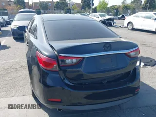 2016 Mazda 6 i Touring with VIN JM1GJ1V57G1444843, listed as a IAAI auction lot 41920436 with 154,863 mi miles and . Bid and sale history available at DreamBid. Image 3.