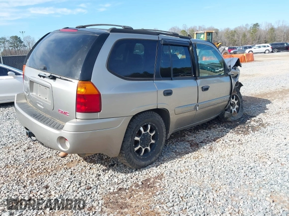 2003 GMC Envoy SLT with VIN 1GKDS13SX32203909, listed as a IAAI auction lot 41457713 with 199,507 mi miles. Bid and sale history available at carsss.com. Image 4.