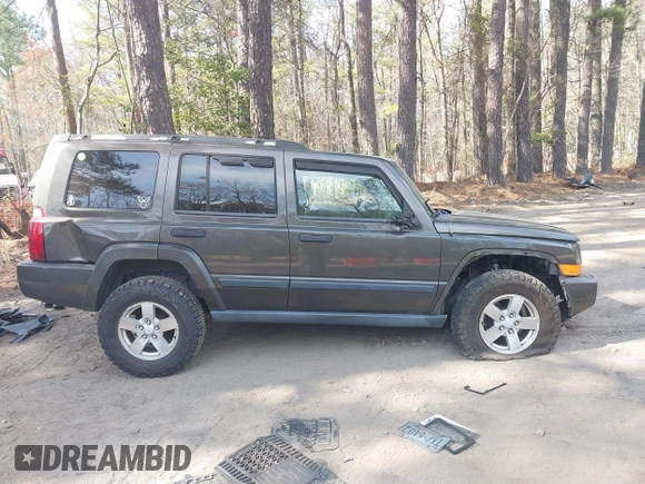 2006 Jeep Commander with VIN 1J8HG48K36C342666, listed as a IAAI auction lot 41908526 with 199,163 mi miles. Bid and sale history available at carsss.com. Image 14.